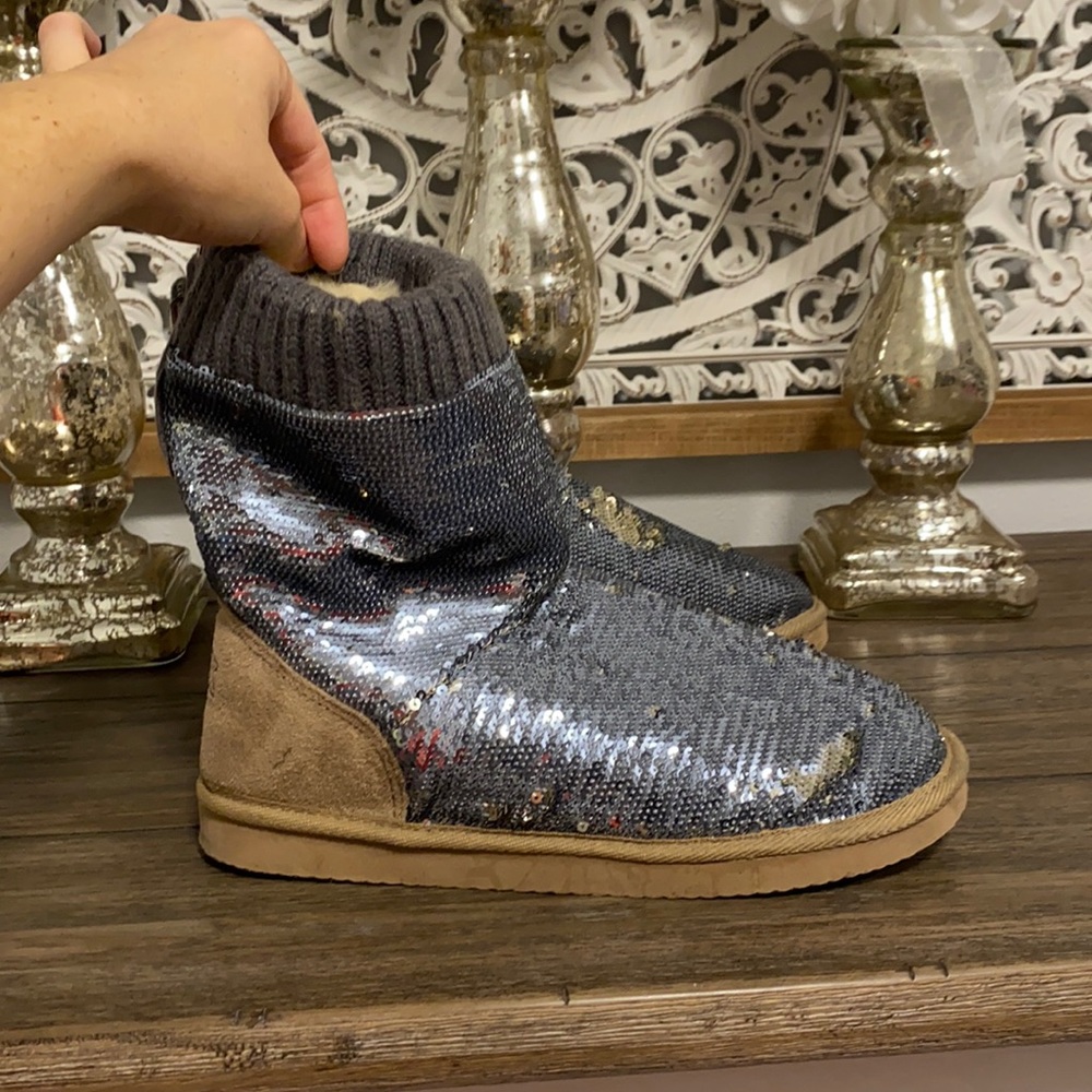 Victoria secret boots. Sequins change color.